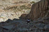 Stella picks her way up the rocky slope.