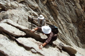 Stella leads at the crux; Frank follows.