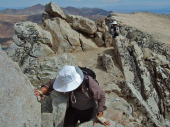 Stella prepares to make another difficult maneuver to surmount a boulder.