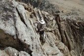 Frank traverses a nice ledge above the south face.