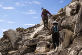 Bill and Stella climb the remaining steps to the summit.