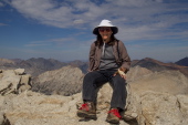 Stella sits upon the summit knob of Mt. Conness.