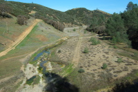 The old San Antonio Valley Road is a faint track through the bed of Arroyo Bayo.