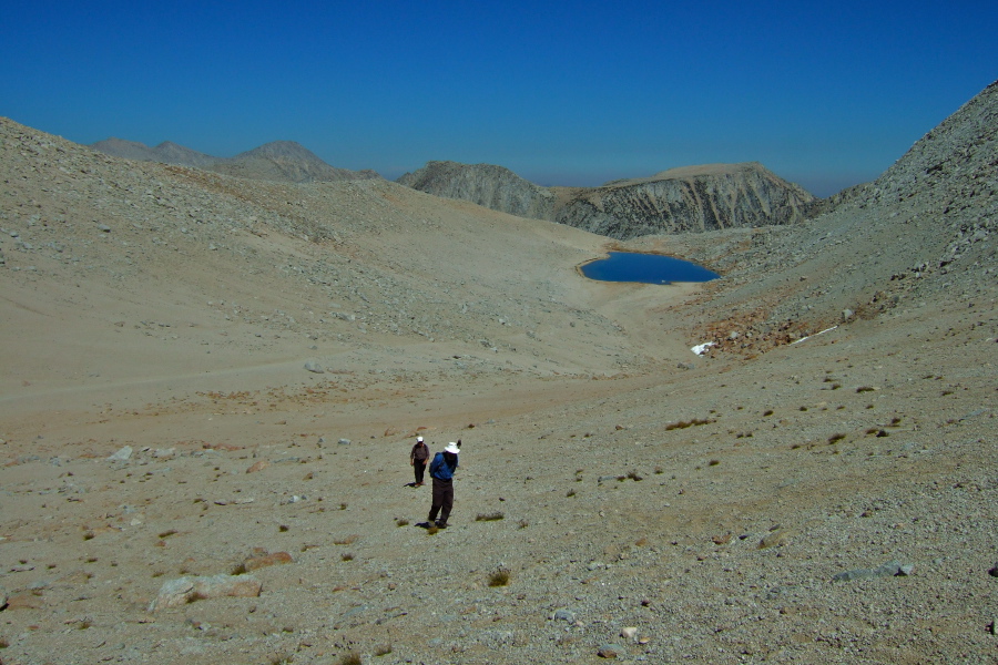 Frank and Stella climb up to the shoulder of Mt. Starr.