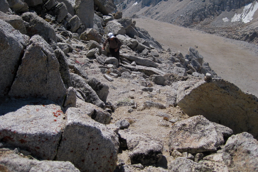 Stella heads toward the cairn.