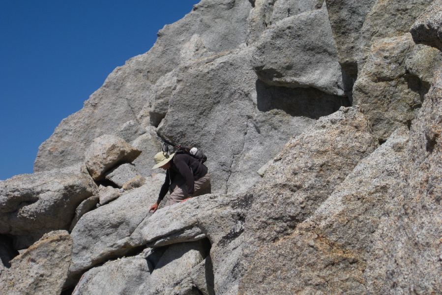 Just have to squeeze myself around this overhanging rock.