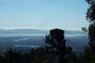 Downtown Oakland and fog rolling over San Francisco from the high point along Skyline Blvd., Oakland