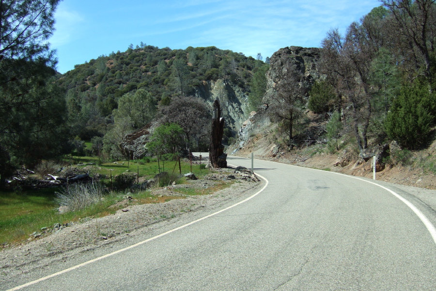 Mines Road passes several volcanic outcroppings like the rock on the right.