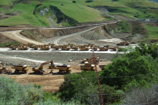 Idle earth-moving equipment at Calaveras Dam