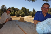 Bill (l) and Ron Bobb stop for lunch at a picnic table in the shade.