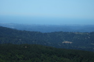 Santa Cruz and Monterey Bay through the haze from Mt. Umunhum Road