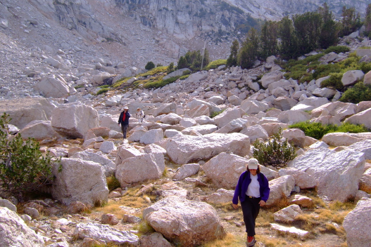 Stella, Frank, and David descend through the Hall Reserve valley.