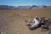 David rests at the halfway cairn (11620ft).