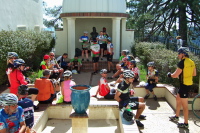 Riders eat lunch on the observatory patio.