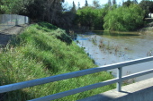 Swiftly-flowing Guadalupe River at Montague Expressway