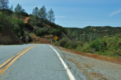 Cyclists passing the other direction at China Grade Summit.
