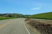A group of cyclists waiting at a local summit on Calaveras Rd.