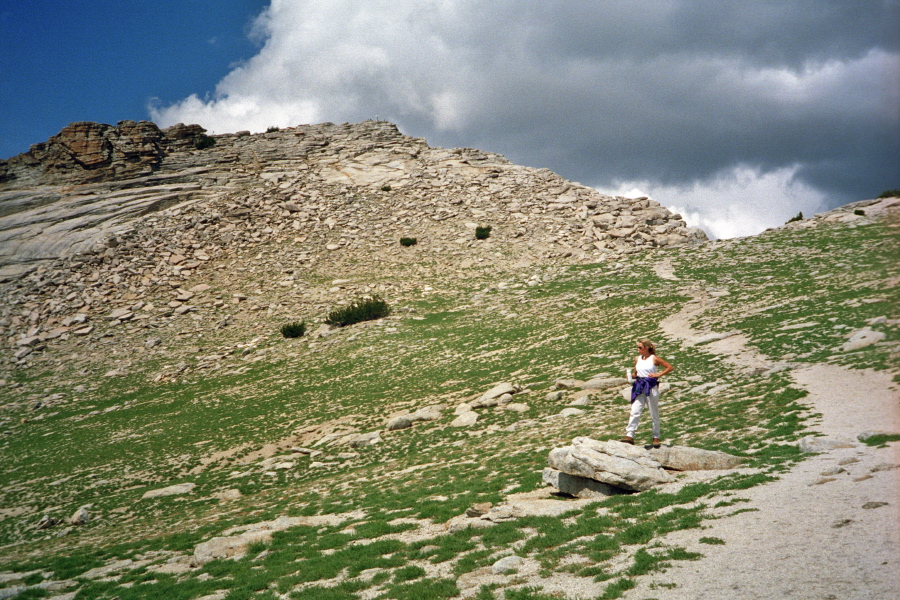 Laura surveys the land on the trail to the summit of Mt. Hoffman.