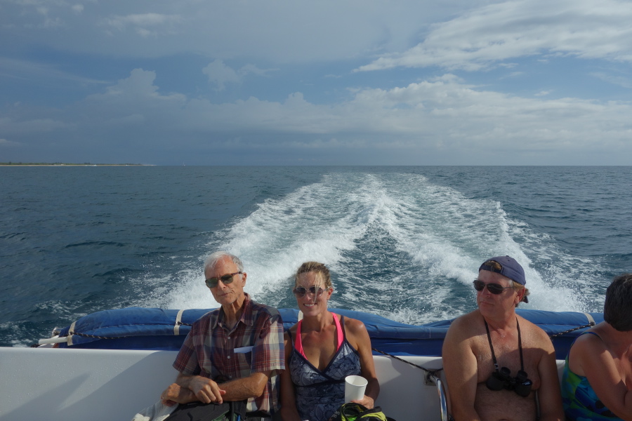 David and Laura sit in the stern.