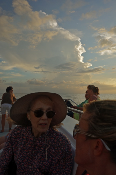 Kay and Laura converse while the sun prepares to set.