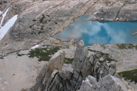 Dad is resting in the rocks next to upper Conness Lake, somewhere near the center of the picture.