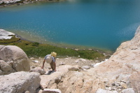 Climbing over the large rock next to lower Conness Lake. (10,550ft)