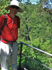 Bill at the overlook for Kahuna Falls, invisible in the recess across the canyon