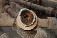 Inside of pipe nearly occluded from rust.