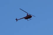 A small helicopter flies over.