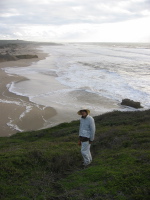 David climbs the bluff at the north end of Pescadero Beach.