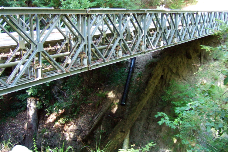 Under the bailey bridge.