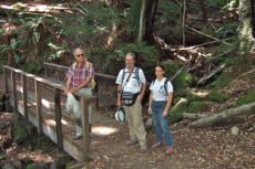 David, Frank, and Stella on Dean Trail at bridge over McGarvey Creek.