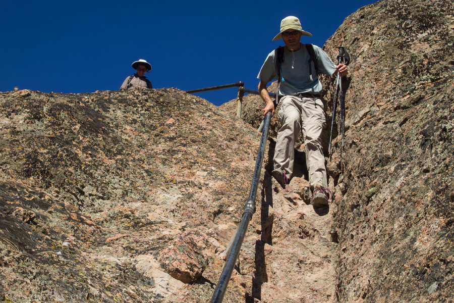 Bill descends the long stairway with the hot railing.