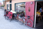 Bikes parked in front of Upper Crust Pizza.
