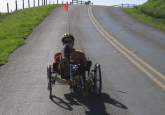 Zach Kaplan pedaling his trike.