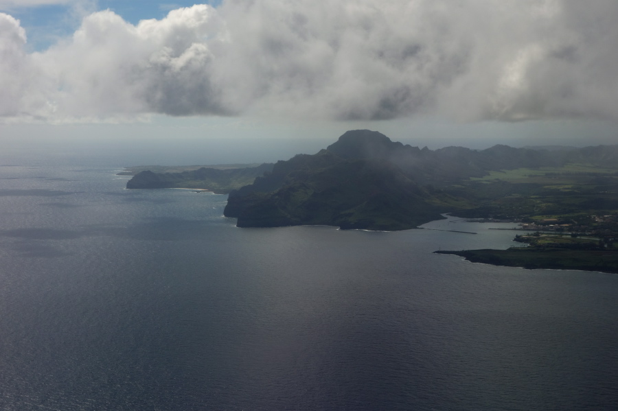 Mt. Ha'upu and the beaches and coves marching southwest to Makahuena Point
