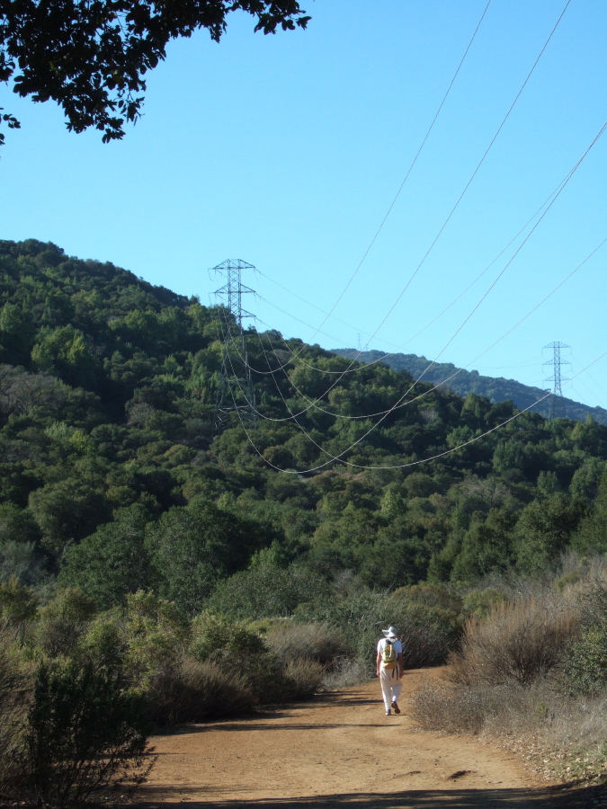 David hikes up the PG&E Trail.
