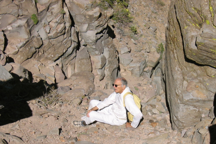 David rests on the way up the chute to the top of Sherwin Crest.