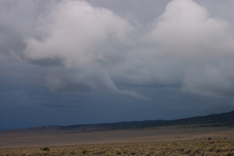 A disappating funnel-cloud over the Snake Valley.