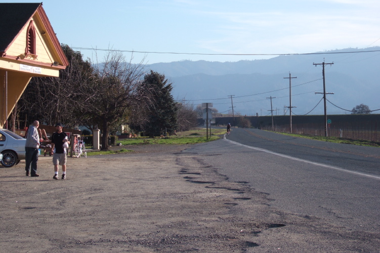 Here she comes!  The first (and last) solo woman finisher on the 100-mile course.