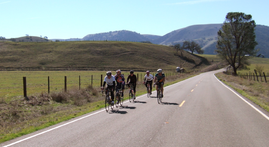 A team of five team rides north through Peachtree Valley.