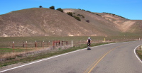 A rider passes through the low spot in Topo Valley.