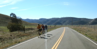 100k riders climbing across Bitterwater Valley.