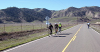 Three-man team rides south through Peachtree Valley.