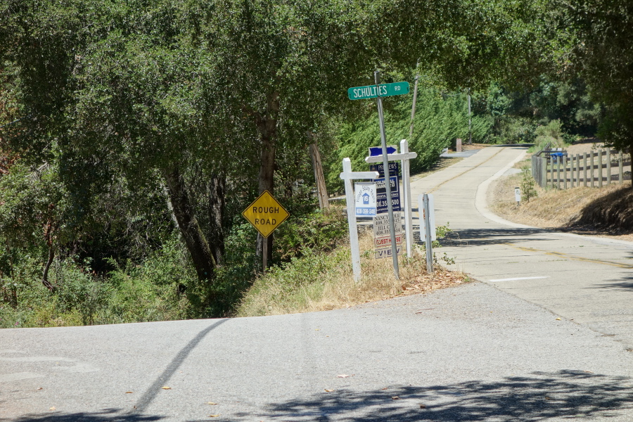 Schulties Road veers left and downhill off Old Santa Cruz Highway