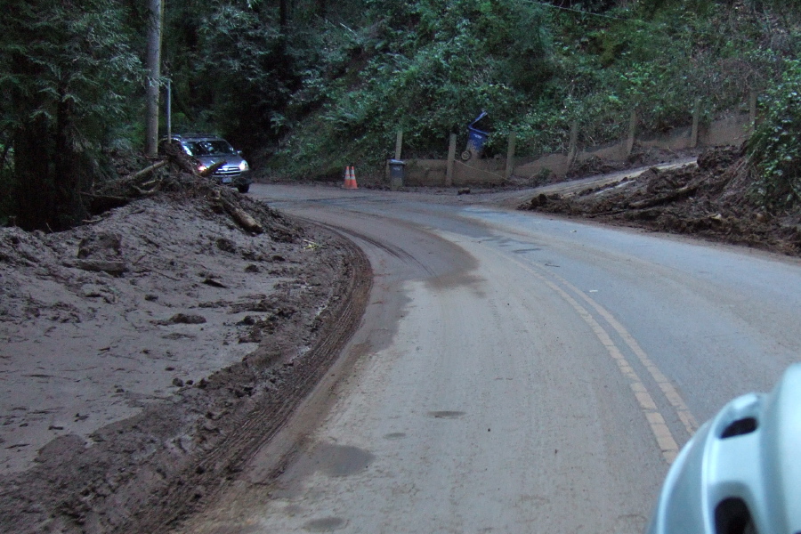 Riding through the remains of a mud slide onto Glenwood Drive