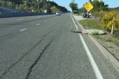 Storm grate in the right lane of CA17 between Bear Creek Rd. and Alma Bridge Rd.