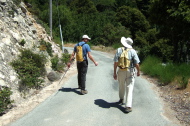 Bill P. and David walk down Indian Trail.