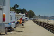 RVs lined up along the beach walkway