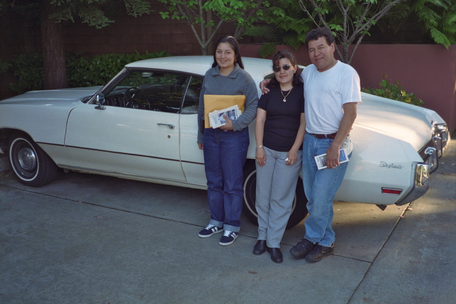Buick with new owner (left) and parents